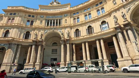 historic architecture with people and vehicles in motion