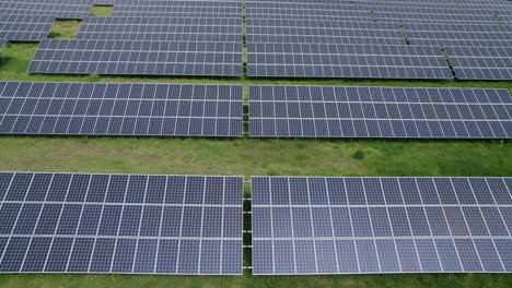 Aerial-trucking-close-shot-of-the-solar-panels-in-the-solar-power-plant