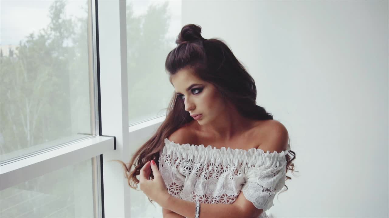 la mujer de la ventana.