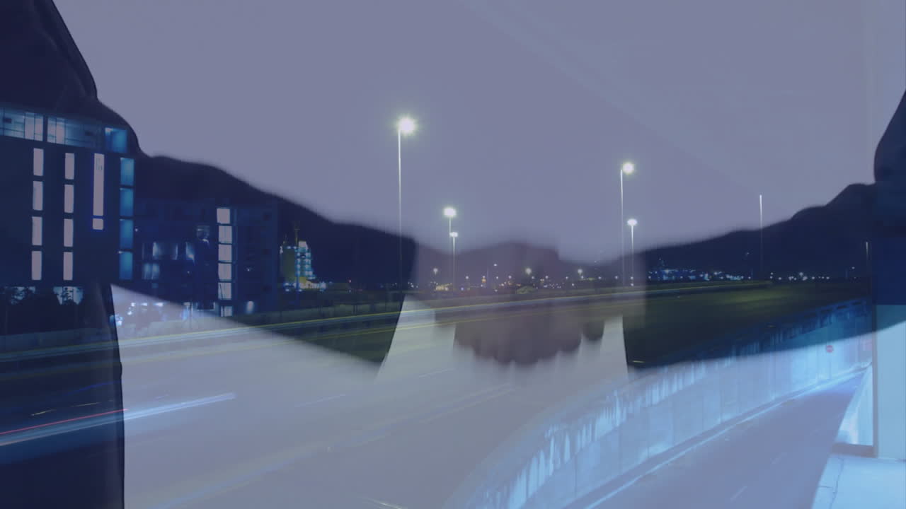 Handshake animation over night cityscape with blurred lights and buildings