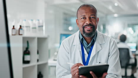 scientist in a lab using a tablet