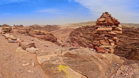 stones marking the limit to access the edge of a dangerous rock. iconic scenery of petra, jordan, west asia.
