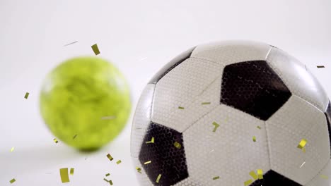 Animation-of-gold-confetti-falling-over-soccer-ball-and-bowling-ball