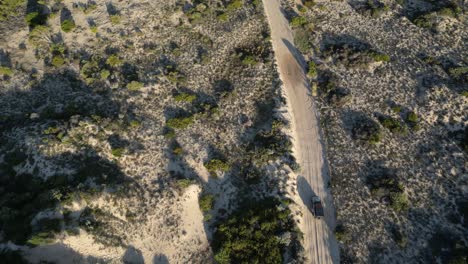 Top-view-over-the-sandy-road-leaving-Preston-beach-in-western-Australia