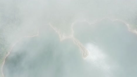 Lake-Danao,-San-Juan,-Southern-Leyte,-Philippines---Top-View-Of-The-Lake-Overcast-By-Steaming-Fog