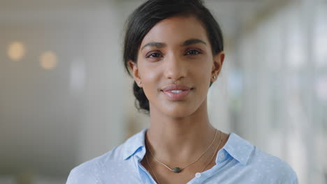 portrait-happy-mixed-race-business-woman-smiling-enjoying-successful-career-proud-entrepreneur-in-office-workplace-testimonial-4k-footage