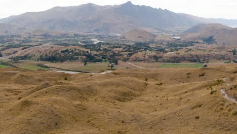 Panning-reveal-of-iconic-mountain-from-across-valley