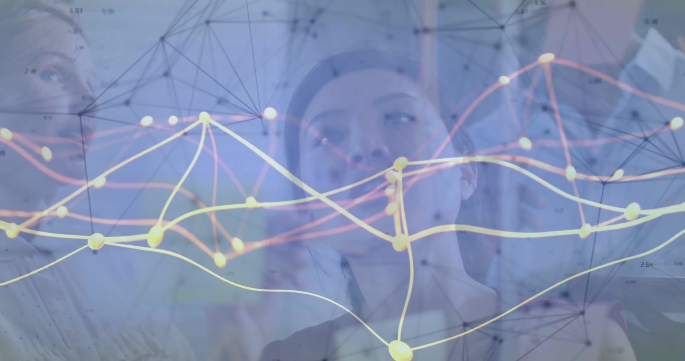 Centered woman raising hand and pointing at node, colleagues leaning and analyzing network display