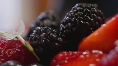 close-up of mixed berries and strawberries