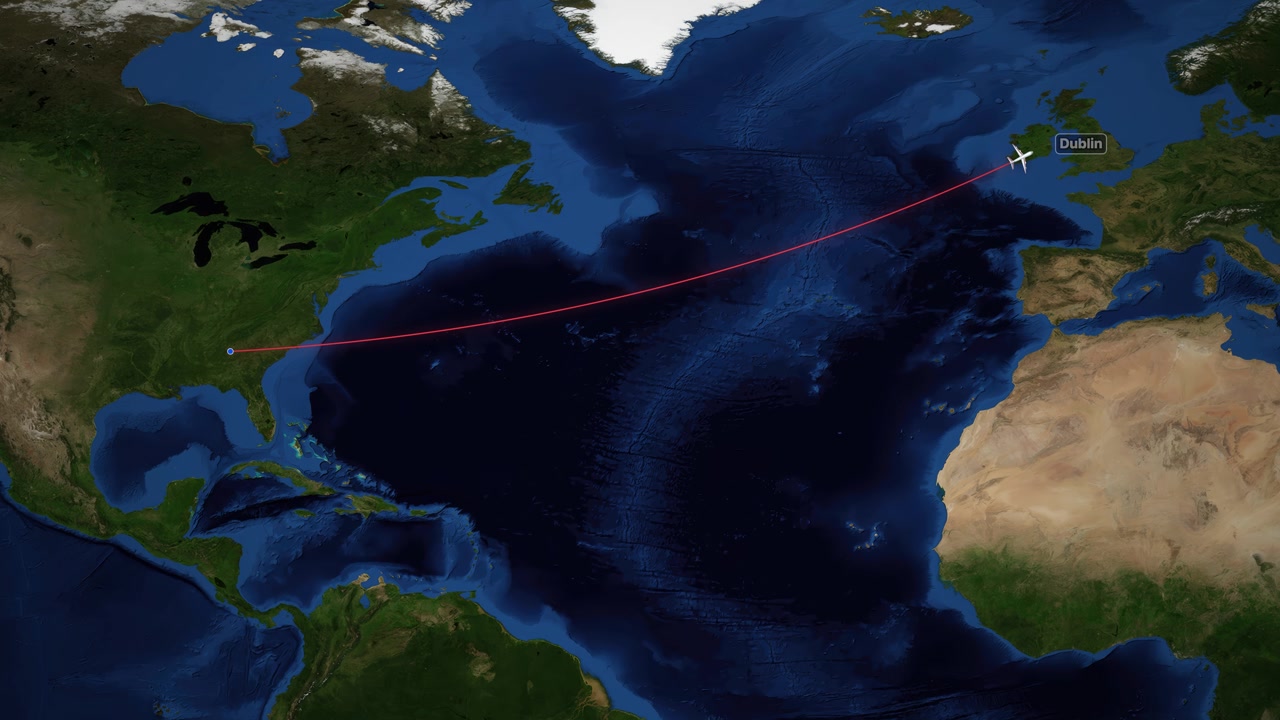 Animated airplane icon follows red line across Atlantic Ocean from Atlanta to Dublin map