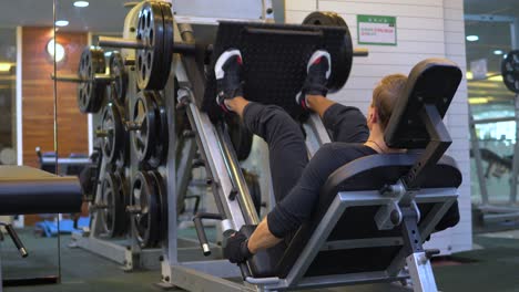 quadriceps leg press gym exercise