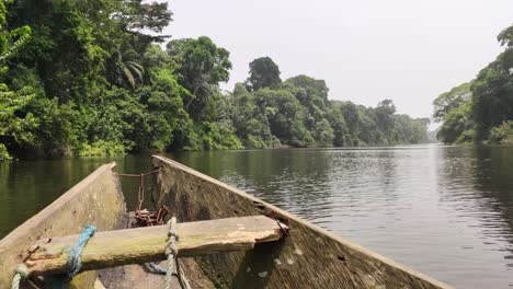 Canoeing-Cameroon's-jungle-rivers,-Pygmy-village,-Africa