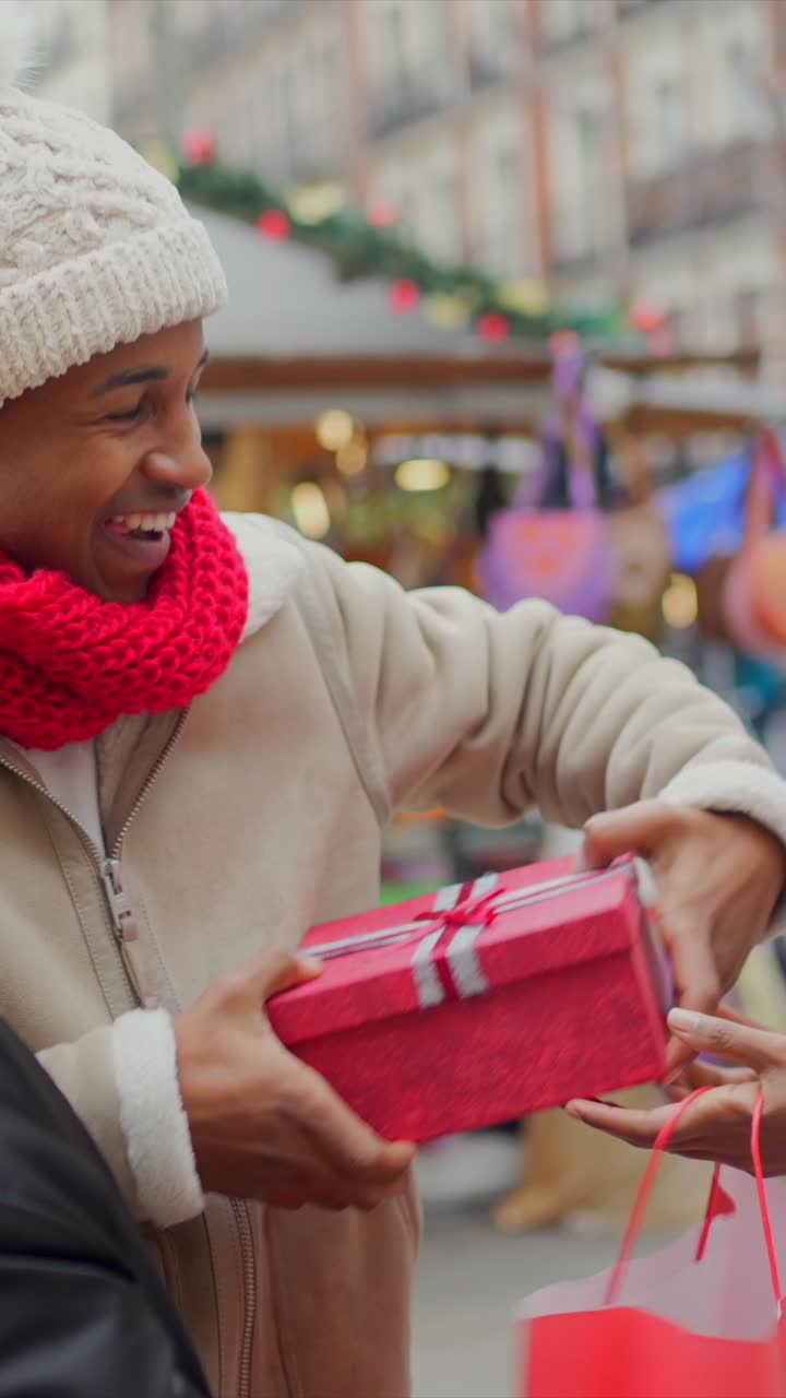 People exchanging gifts at winter fair