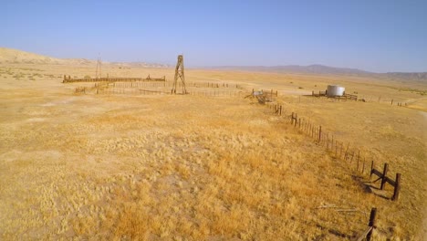 an aerial over an abandoned ranch in the desert of the carrizo plain