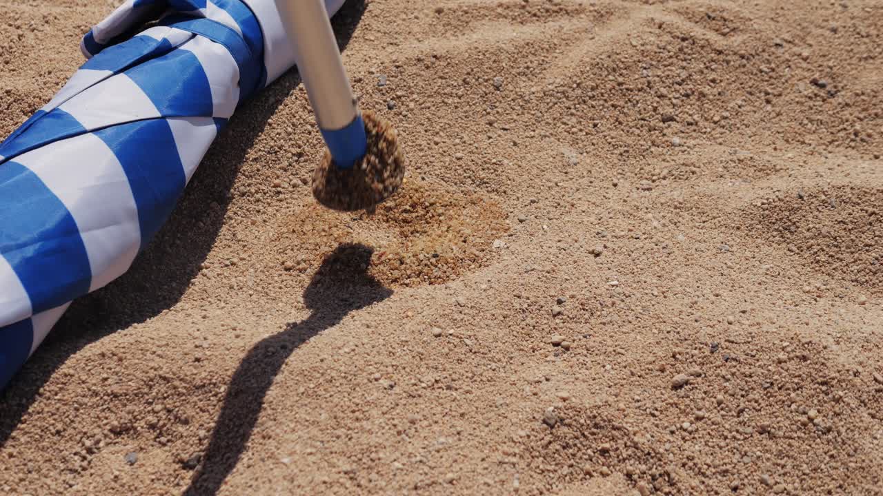 Beach Umbrella in the Sand