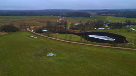 drone parallax above wintry calm village, serene atmosphere in the countryside