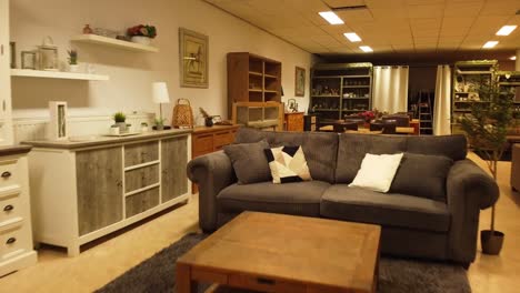 interior of a furniture showroom with sofa and various home decor