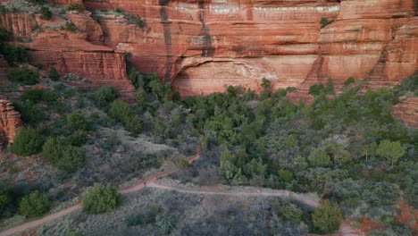 aerial view fly in to palatki ruins in the coconino red rocks of sedona arizona