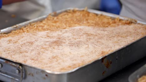 sugar being evenly spread over apple filling