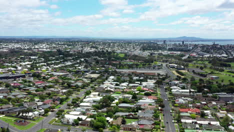 AERIAL-Over-Geelong-City,-Australia-With-You-Yangs-and-Kardinia-Park