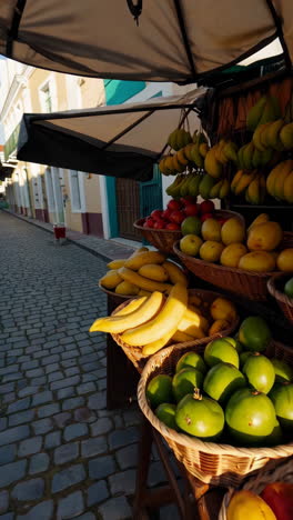 colorful fruit stand on a cobblestone street