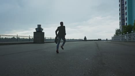 man running on rooftop