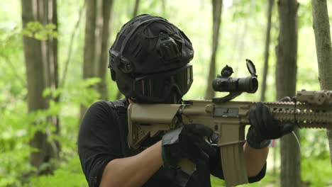 tactical army guy switches from rifle to pistol