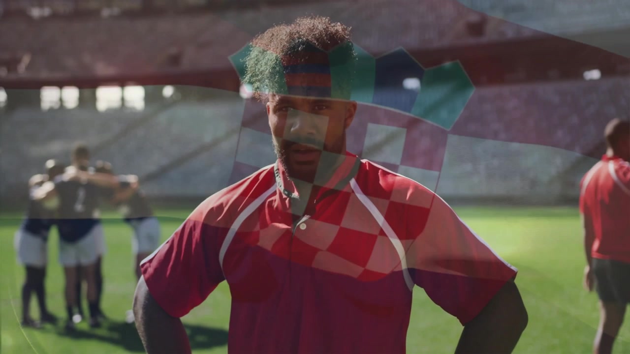 Sportsudøver sætter hænderne i siden, startflag-overlay skifter, gruppe samles tæt, strækker ud