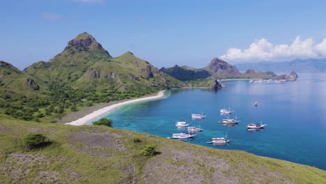 Breathtaking-Komodo-Island-in-Indonesia,-Establishing-Aerial-on-Sunny-Day