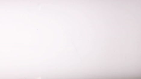 ink cloud overlay. color blast. blue , red, yellow smoke motion on white background for video editing.