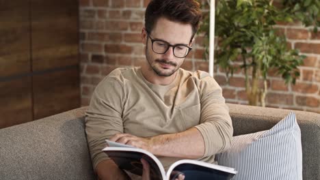 businessman reading a book at home office