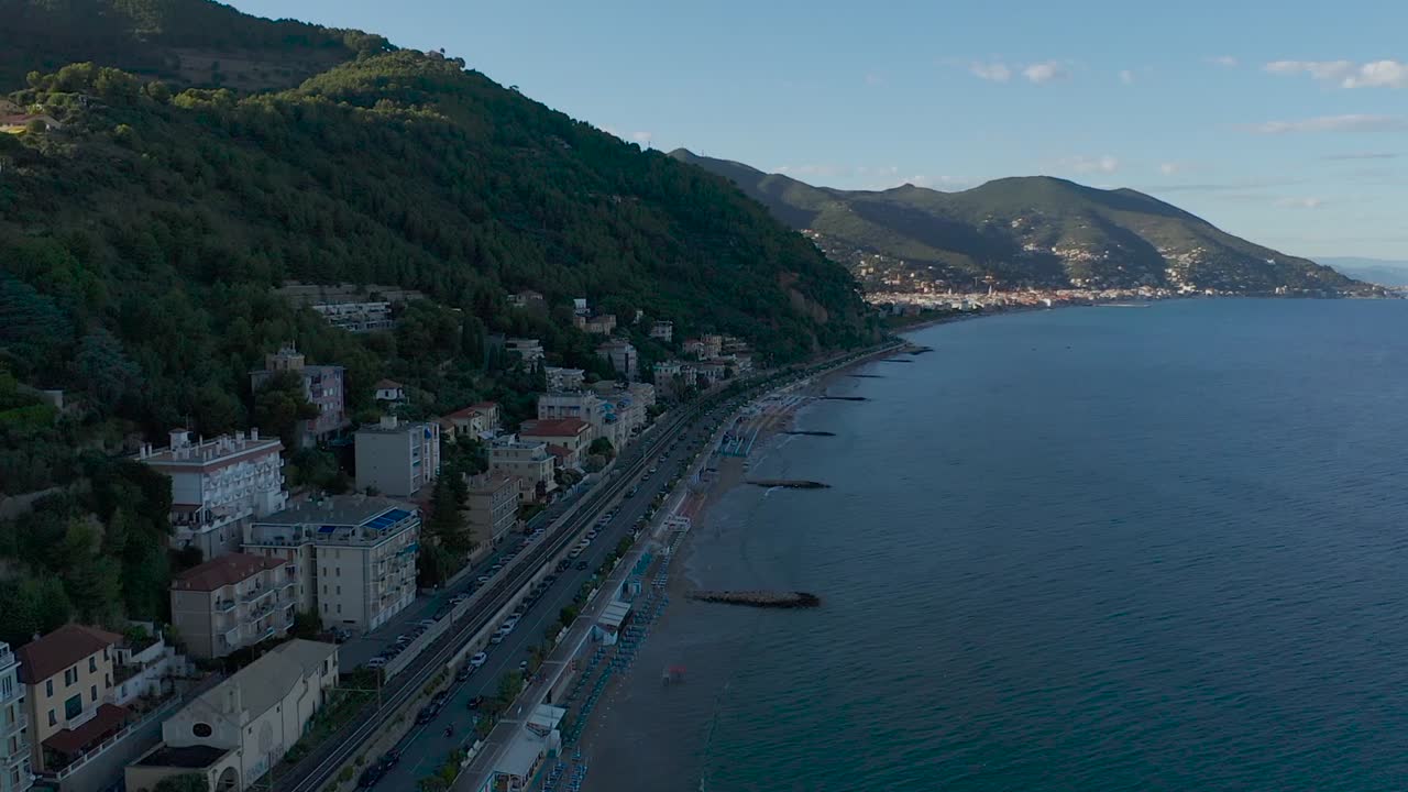 drone shot revealing the ligurian coast during sunset