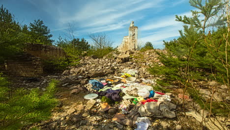 camera rotating in the forest where trash are fallen on the ground near the trees.huge dump in tropical mangrove tree forest. plastic waste rubbish floating in lake water. 4k time lapse video.