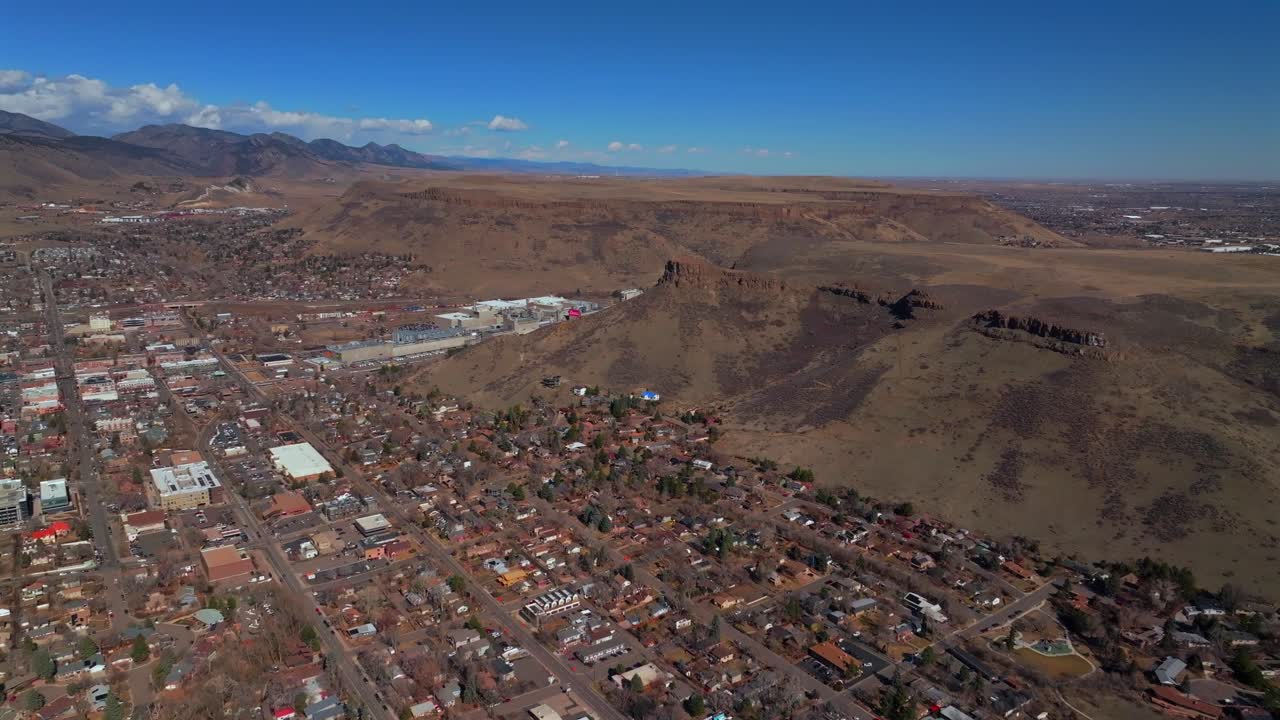 Golden Colorado aerial drone Colorado historic downtown Golden Gate Canyon winter sunny morning afternoon blue sky Boulder Flat Irons Clear Creek Lookout Mountain Coors Beer Factory forward pan
