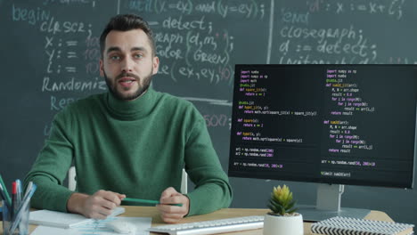man explaining coding concepts