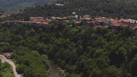 drone over river yantra to historical veliko tarnovo cathedral landmark