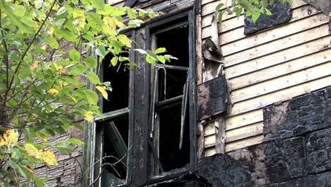 urban decay, medium shot of burnt down house in detroit, michigan, usa-1