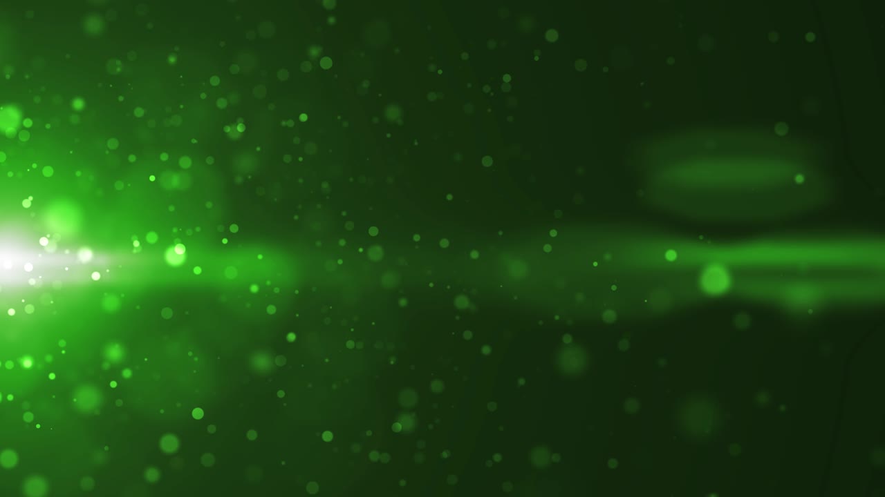 Sfondo in loop con particelle astratte verdi che emettono da una sorgente luminosa