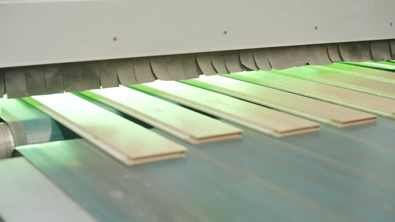 Wooden Planks Moving on Conveyor Belt in a Factory