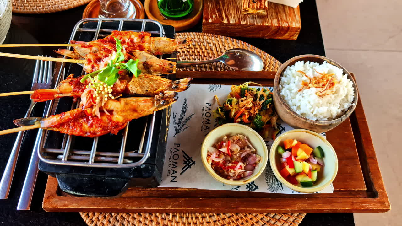Delicious lunch in Paoman restaurant in Bali, close up view
