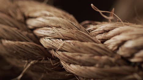 Micro-video-of-close-up-of-brown-string-with-copy-space