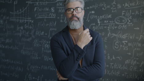 Thoughtful Professor in front of a Chalkboard Filled with Equations