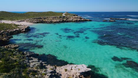 aerial view above the coast of rottnest island, australia- forward, drone shot