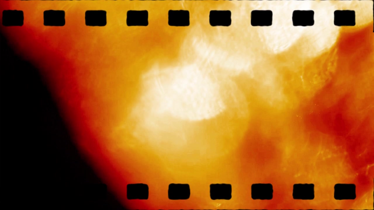 Vintage filmrulle-overlay med røde og orange lyslækager