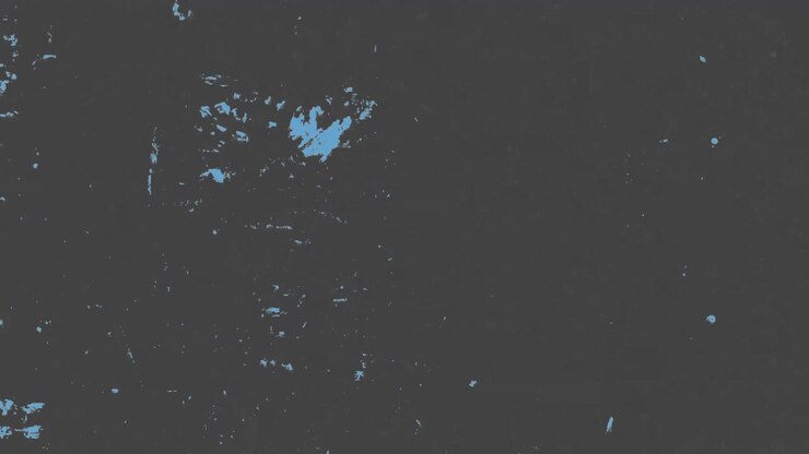 Distressed blue paint splatters grungy, worn texture on dark background