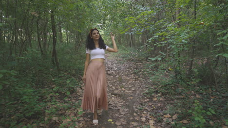 Elegant-Young-Lady-Woman-Walking-Alone-in-Nature-Forest-Park,-Dolly-Tracking-Outside-Shot-of-Slim-Attractive-Girl-Relaxing-in-Nature,-Casual-Trendy-Fashion-Brunette-Stylish-Model