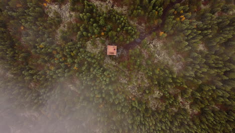 over a watch tower in the clouds