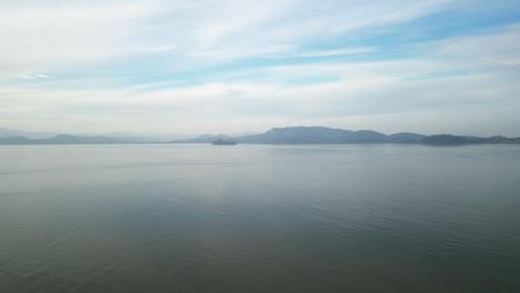 aerial overview of solo boat in waters from point molate beach richmond california usa