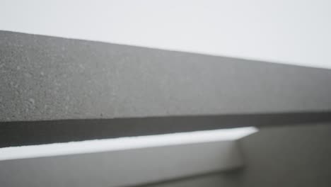 vertical: abstract shot of concrete building pillars