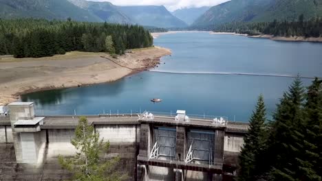 still blue water at the lake in wynoochee dam, washington - aerial drone